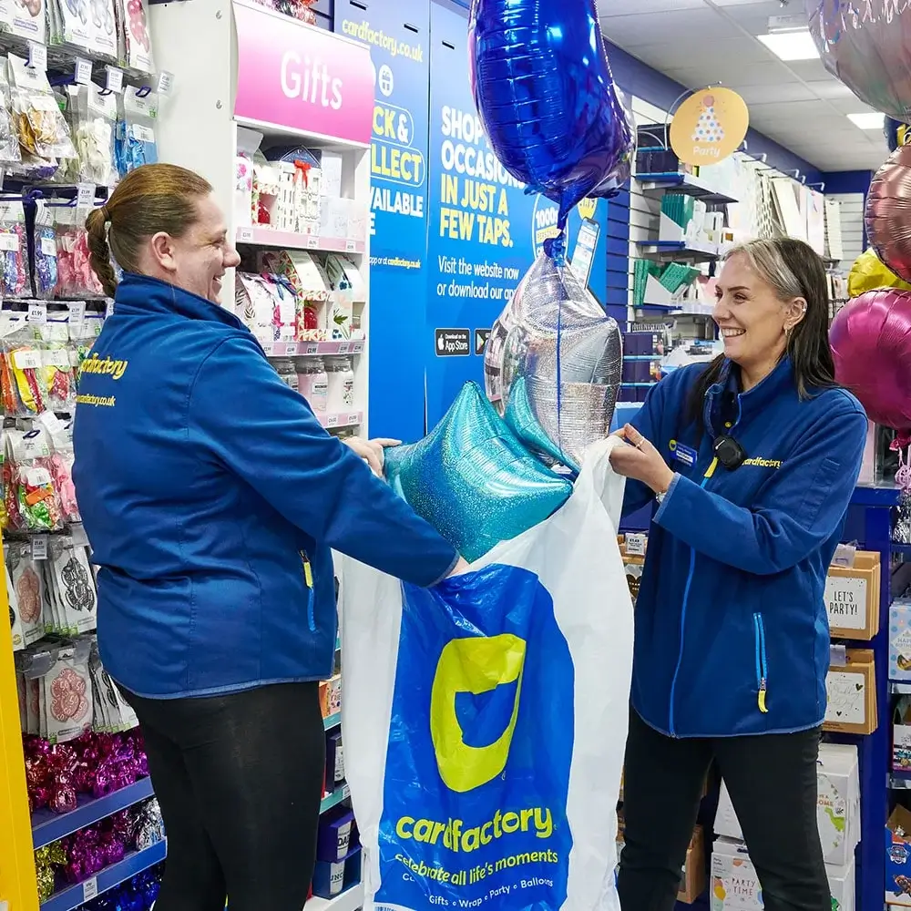 Cardfactory staff with balloons